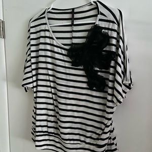 Striped top with statement bow